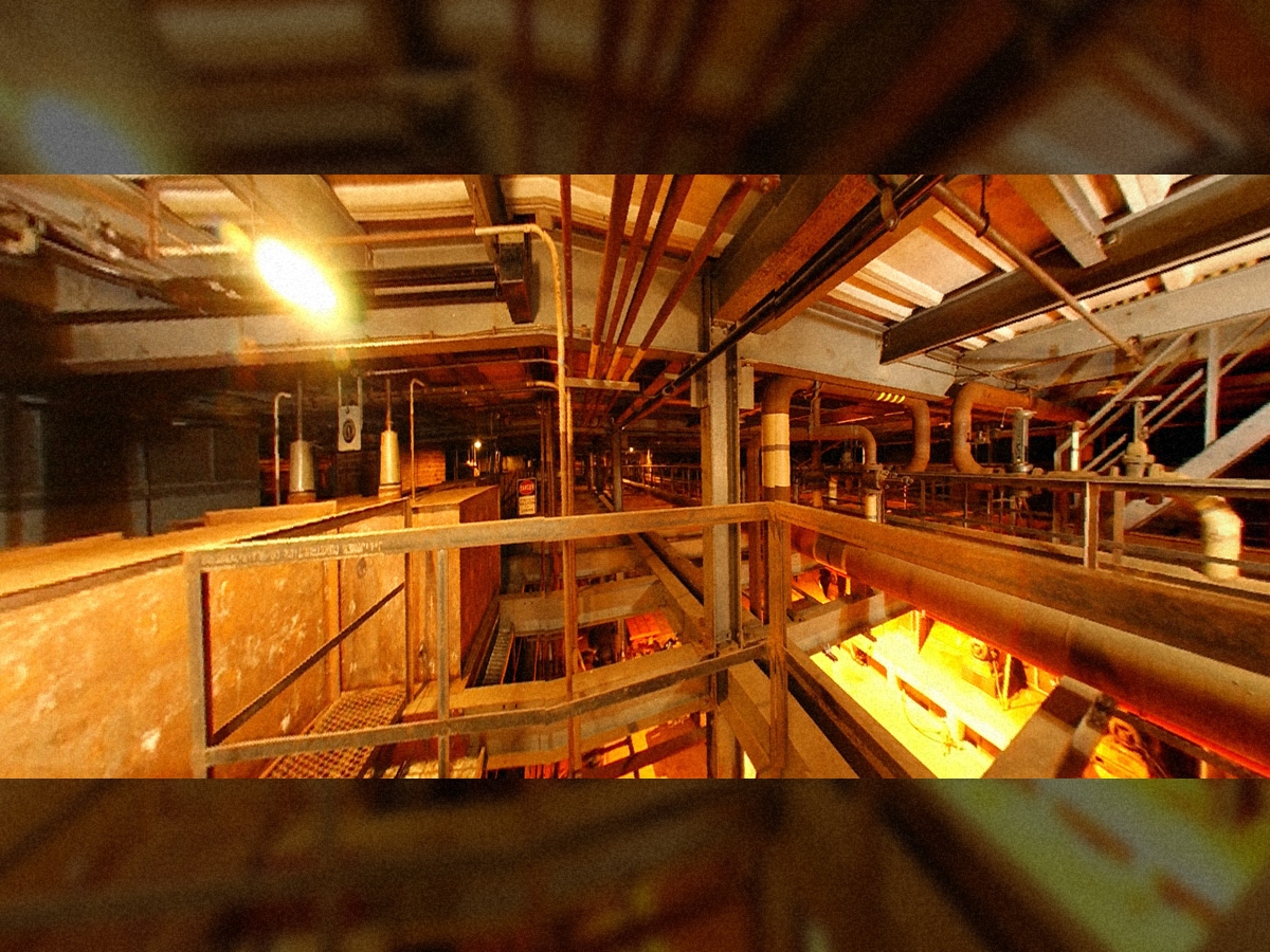 K-25 Pipe Gallery with process pipe enclosure on left and Withdrawal Alley below