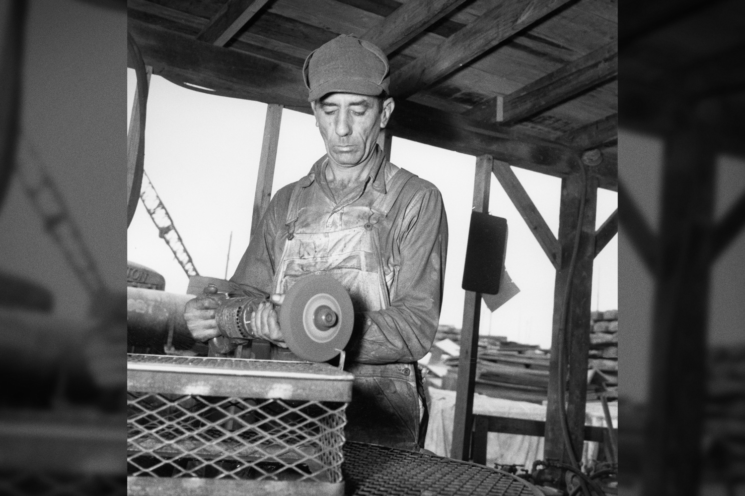 Worker preparing an item to be painted in the Paint Shop
